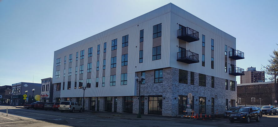 Five companies file mechanics liens against Urbane 218 as building nears completion