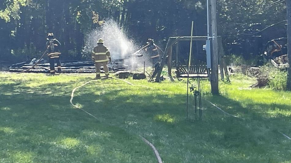Firefighters putting out fire, McDavitt Township, July 15, 2023