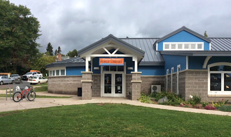 Individual who repeatedly harassed Grand Marais Library staff faces two assault charges